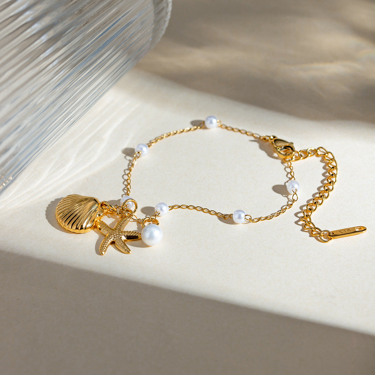 Pulseira com Pingentes Marinhos Ocean Pearl Banhada a Ouro 18K