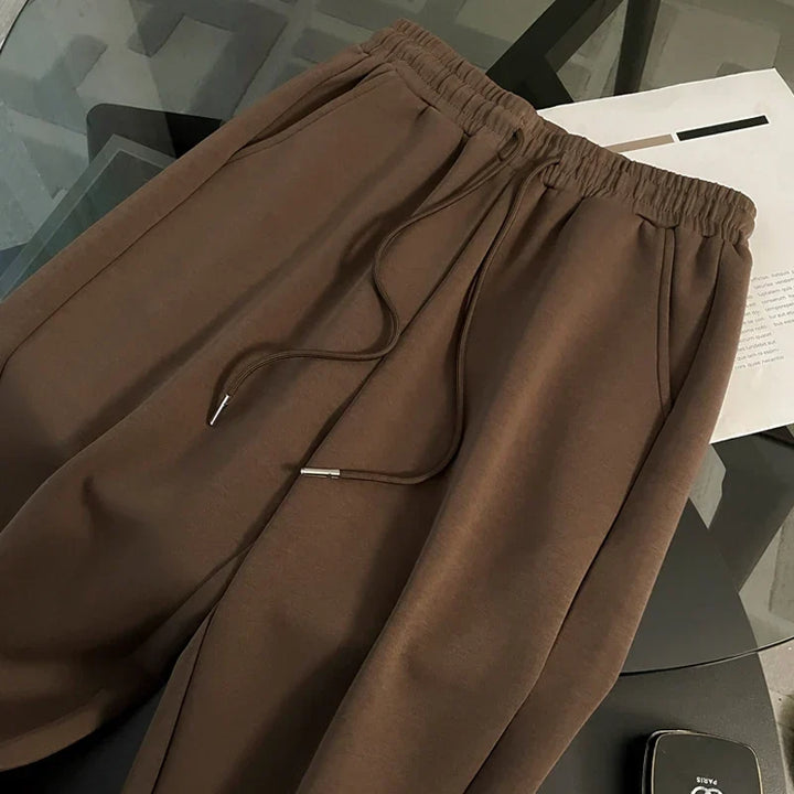 Conjunto Esportivo com Jaqueta Listrada e Calça Pantalona