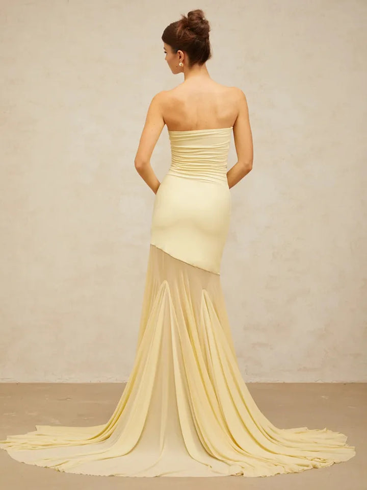 Vestido Maxi Escultural Amarelo com Estrutura de Corpete e Saia Fluida